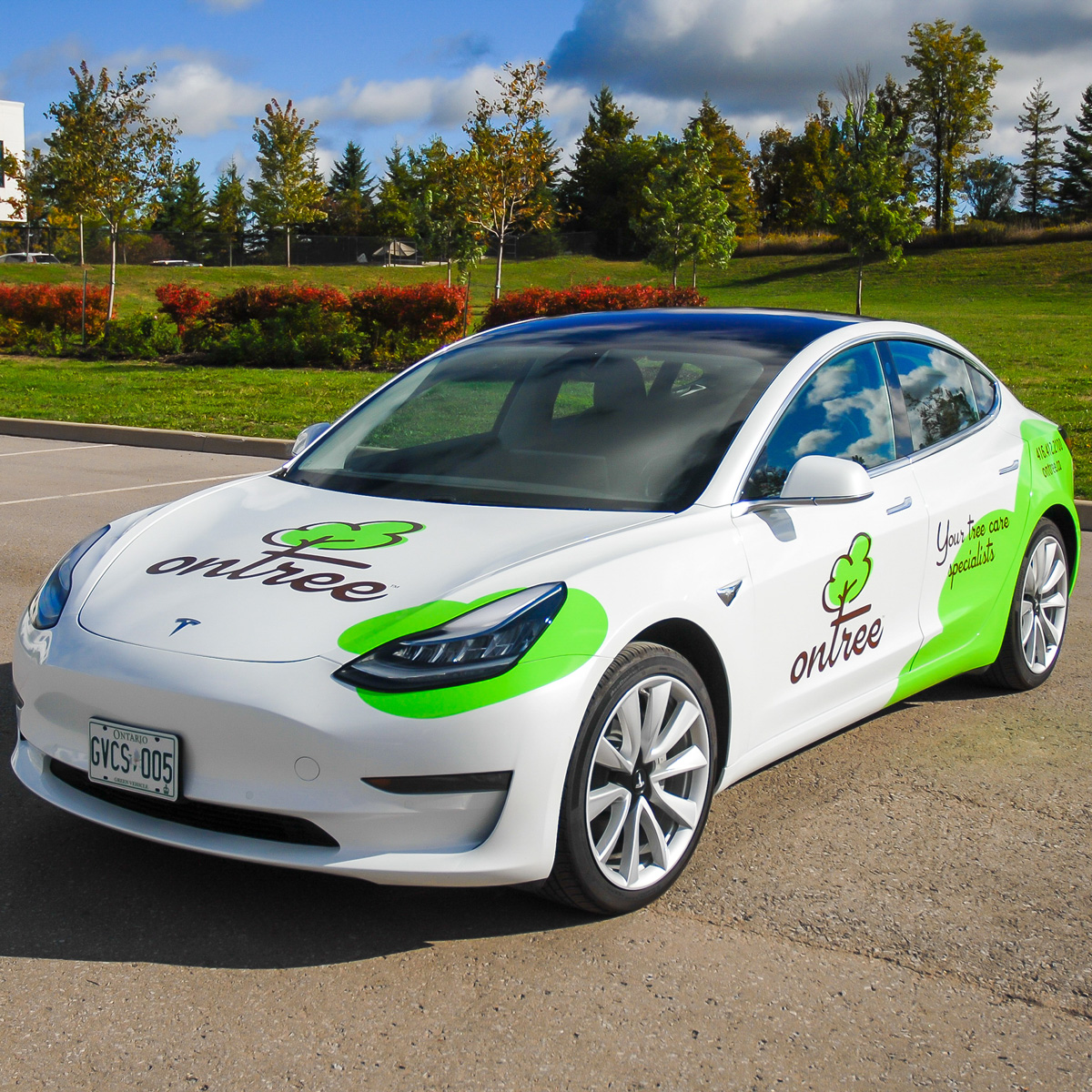 Ontree fleet vehicle wrap on a Tesla Model 3